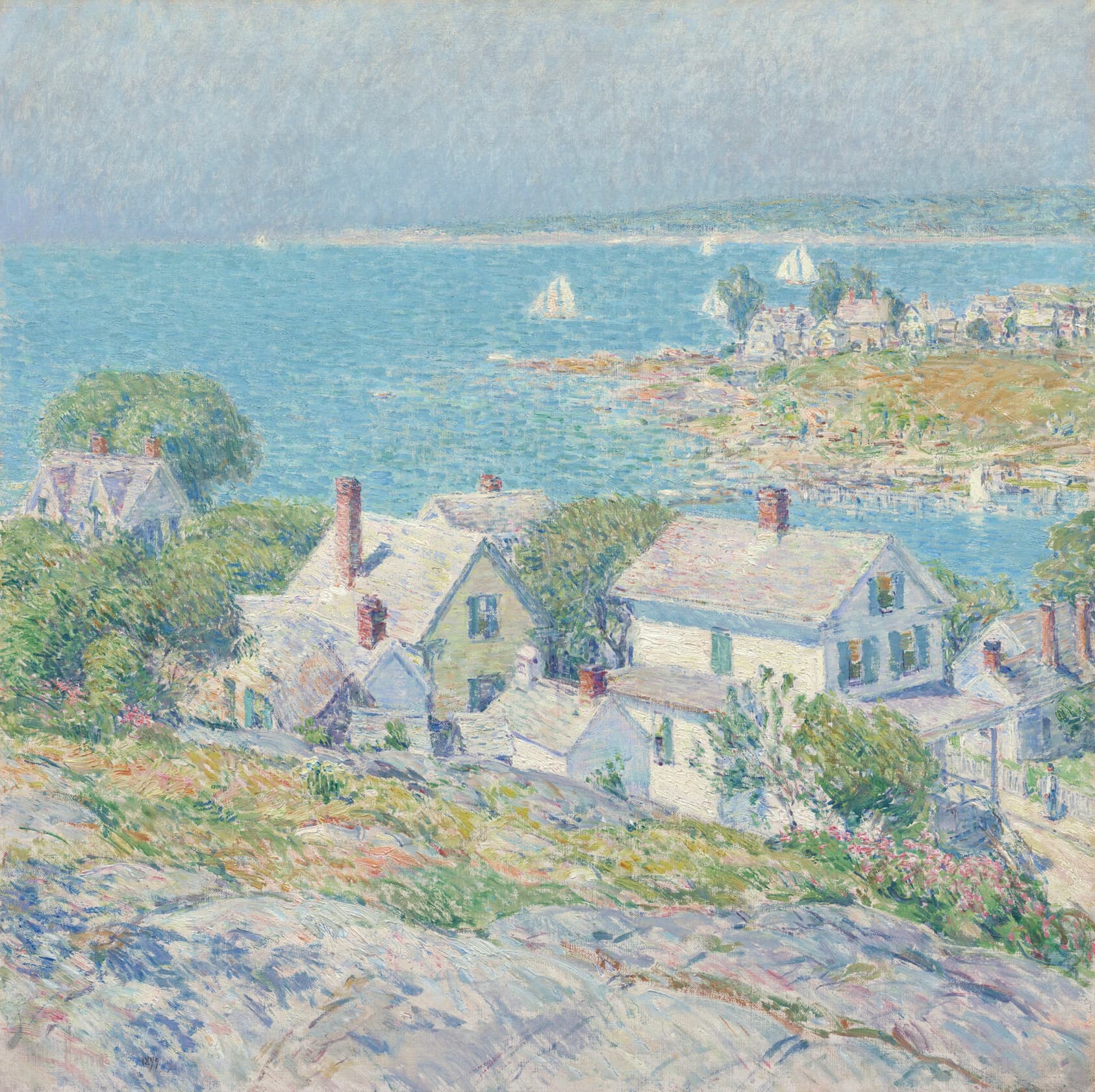 A seascape painted in pastel tones, light-colored houses with red chimneys and light-green shutters in the foreground. The scene is set on a rocky, green hillside overlooking a blue sea with small sailboats.